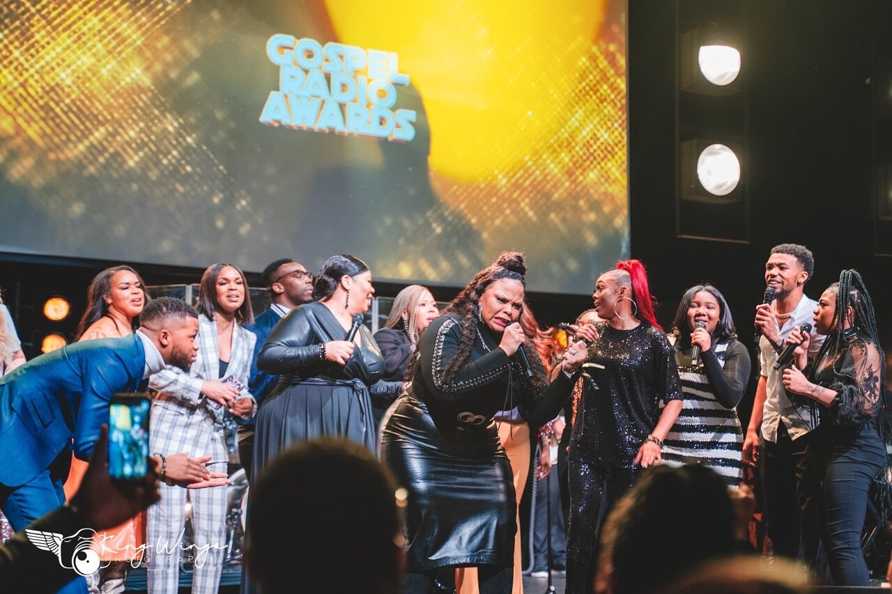 Tamela Mann (center) and other gospel artists at 2020 SOAR Awards